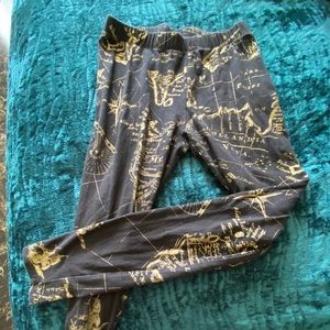 Black and gold map leggings